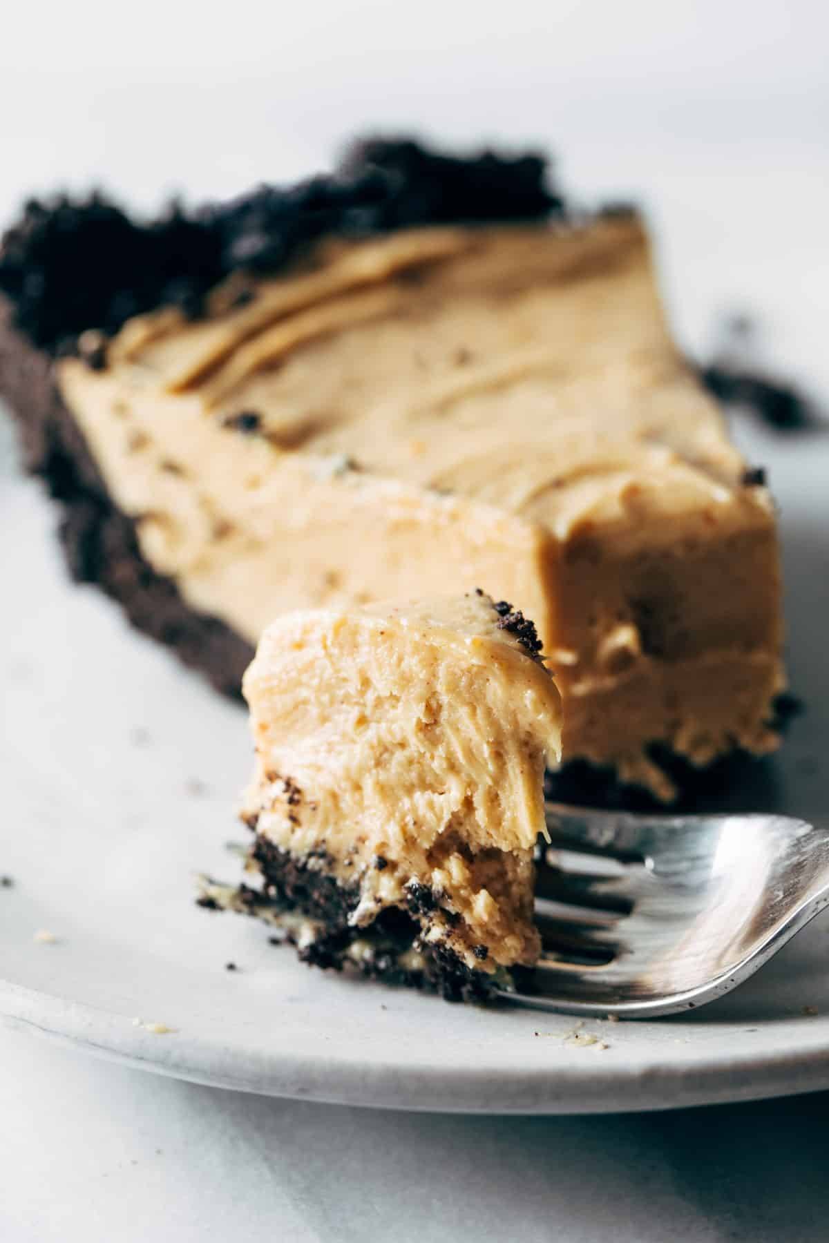 Taking a bite of peanut butter pie.